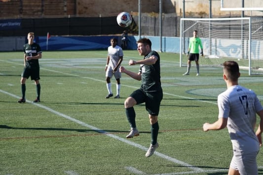 Men playing soccer