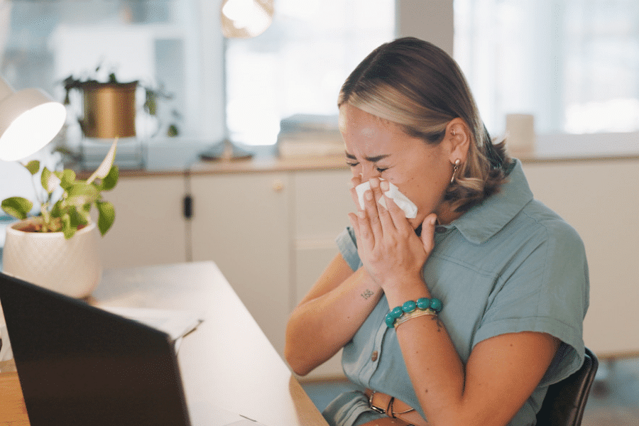 A person experiencing a sneeze in Houston
